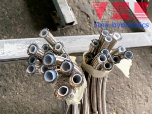 Ống Teflon bọc lưới inox - Ống nhựa chịu nhiệt PTFE bện inox