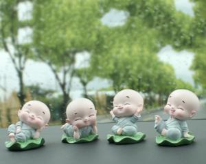 Tượng chú tiểu ngồi lá sen 2 mẫu