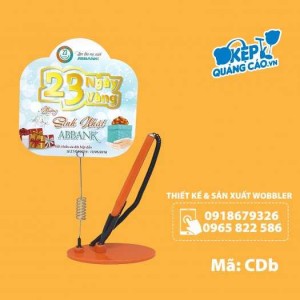 Obbler để bàn có bút bi, chân đế lò xo gắn bút, chân đế quảng cáo có bút, wobbler bút bi