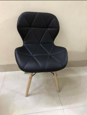 Ghế Eames chân gỗ bọc nệm simili
