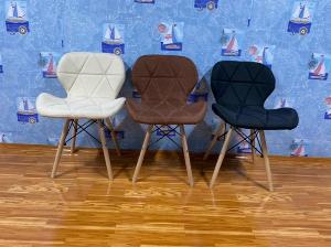 Ghế Eames chân gỗ bọc nệm simili