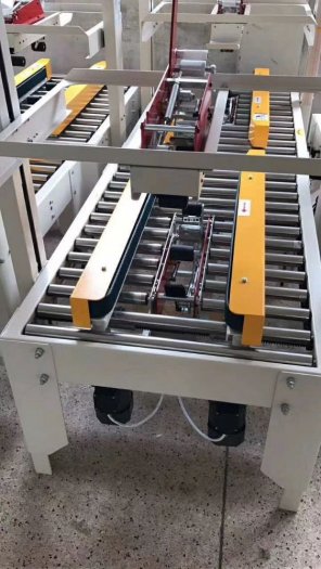 Máy dán băng dính thùng carton 2 mặt bán tự động