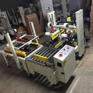 Máy dán băng dính thùng carton, máy dán băng keo 2 mặt trên dưới