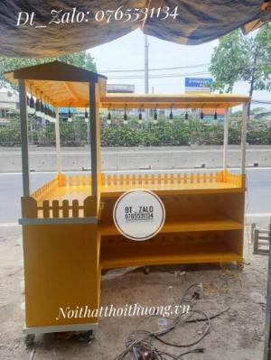 Quầy trà sữa có đèn trên dưới, có mái che sơn màu theo yêu cầu.
