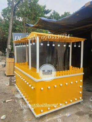 Quầy trà sữa có đèn trên dưới, có mái che sơn màu theo yêu cầu.