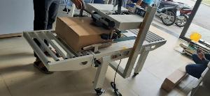 Máy dán thùng carton, máy dán băng keo thùng mặt trên mặt dưới, máy dán thùng carton